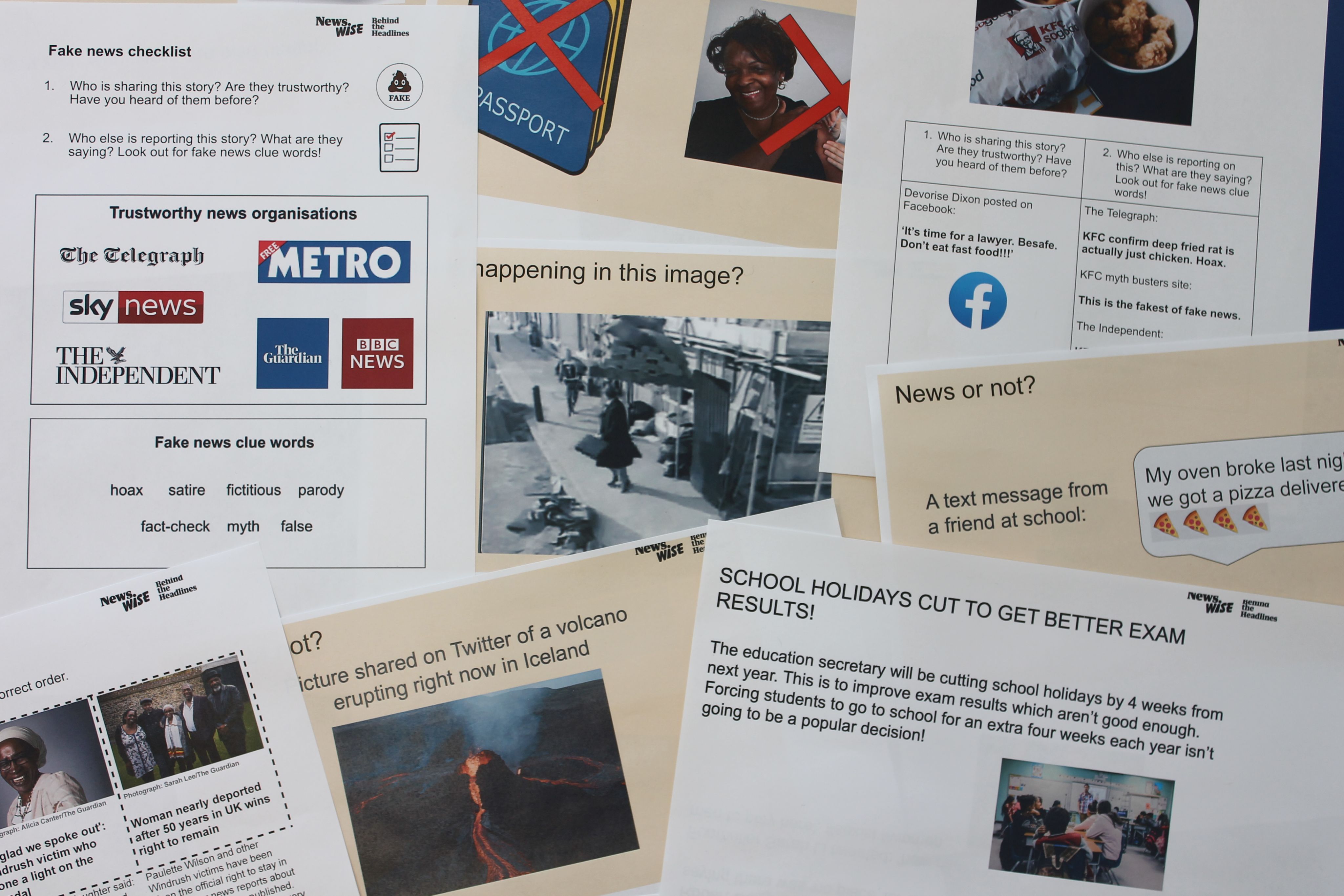 A series of newspaper clippings piled on top of one another